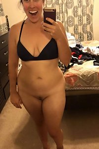 Big, stunning damsel invitingly posing in underwear