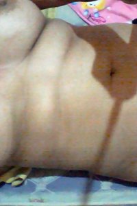 Rounded undoubted woman sensually posing in lingerie